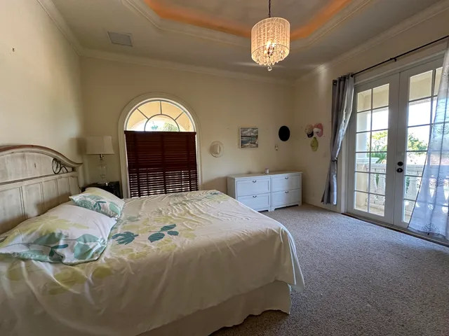 a bedroom with a bed and a furniture