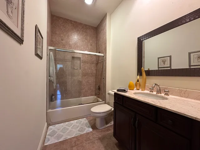 a view of a house with a fountain