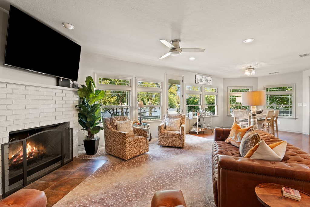 104 River Ranch Road Kingsland, TX 78639 - Photo 16 of 39 Living room featuring a fireplace, recessed lighting, and ceiling fan