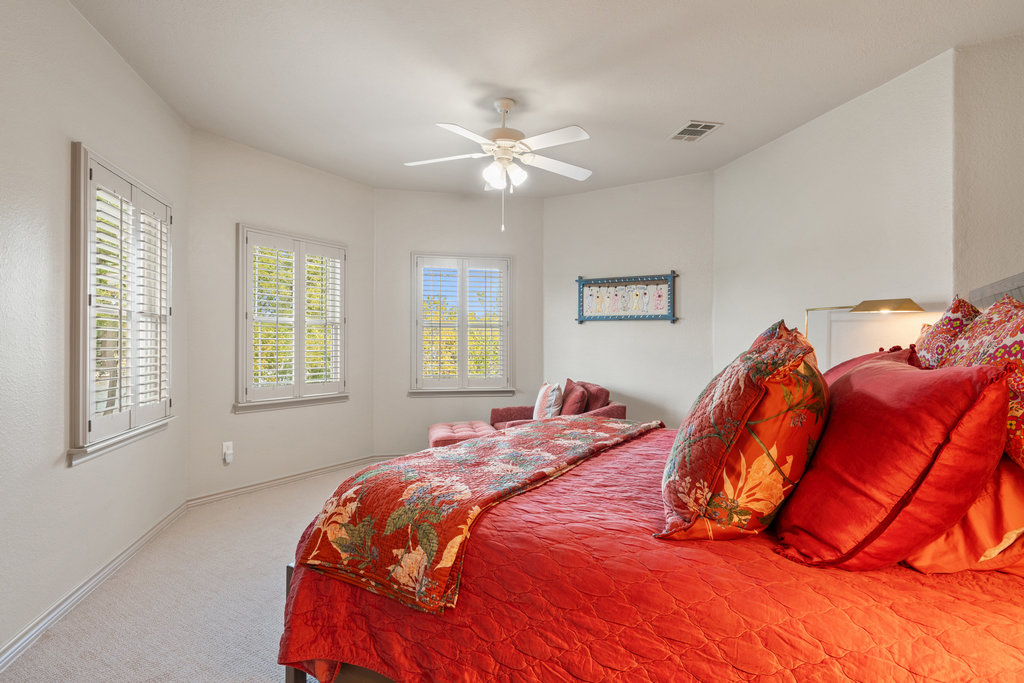 104 River Ranch Road Kingsland, TX 78639 - Photo 20 of 39 Carpeted bedroom featuring ceiling fan