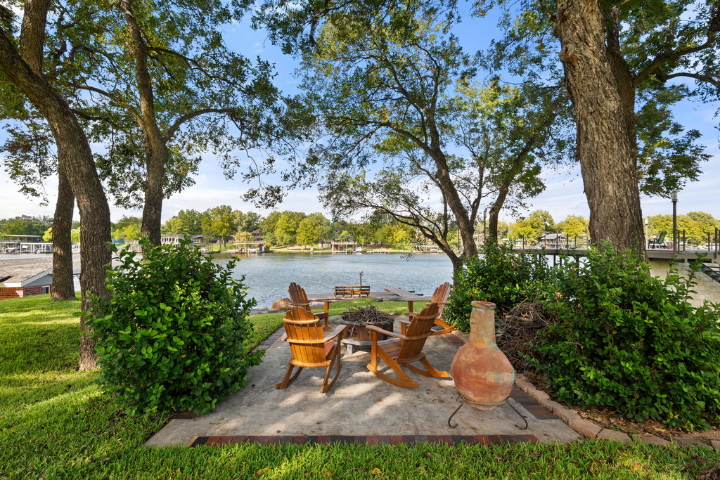 104 River Ranch Road Kingsland, TX 78639 - Photo 31 of 39 View of patio with a fire pit and a water view