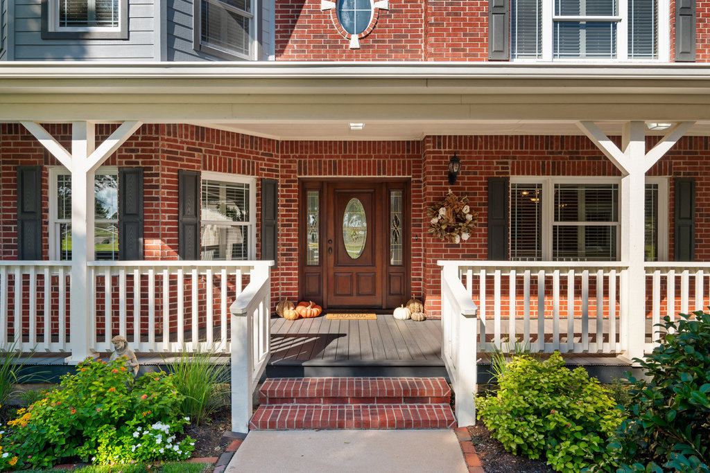 104 River Ranch Road Kingsland, TX 78639 - Photo 5 of 39 Property entrance with brick siding and covered porch