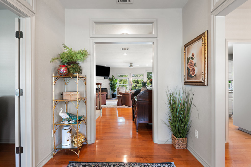 104 River Ranch Road Kingsland, TX 78639 - Photo 6 of 39 Corridor with light wood finished floors and baseboards
