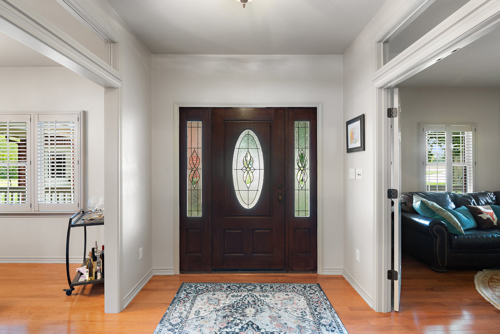 104 River Ranch Road Kingsland, TX 78639 - Photo 7 of 39 Entryway with light wood finished floors and baseboards