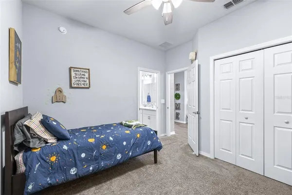 a bathroom with a double vanity sink mirror and double