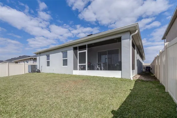 a view of a swimming pool with a terrace