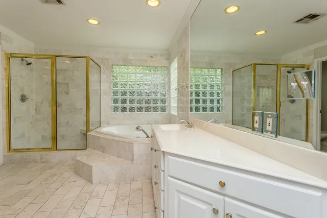 a view of a backyard with wooden fence
