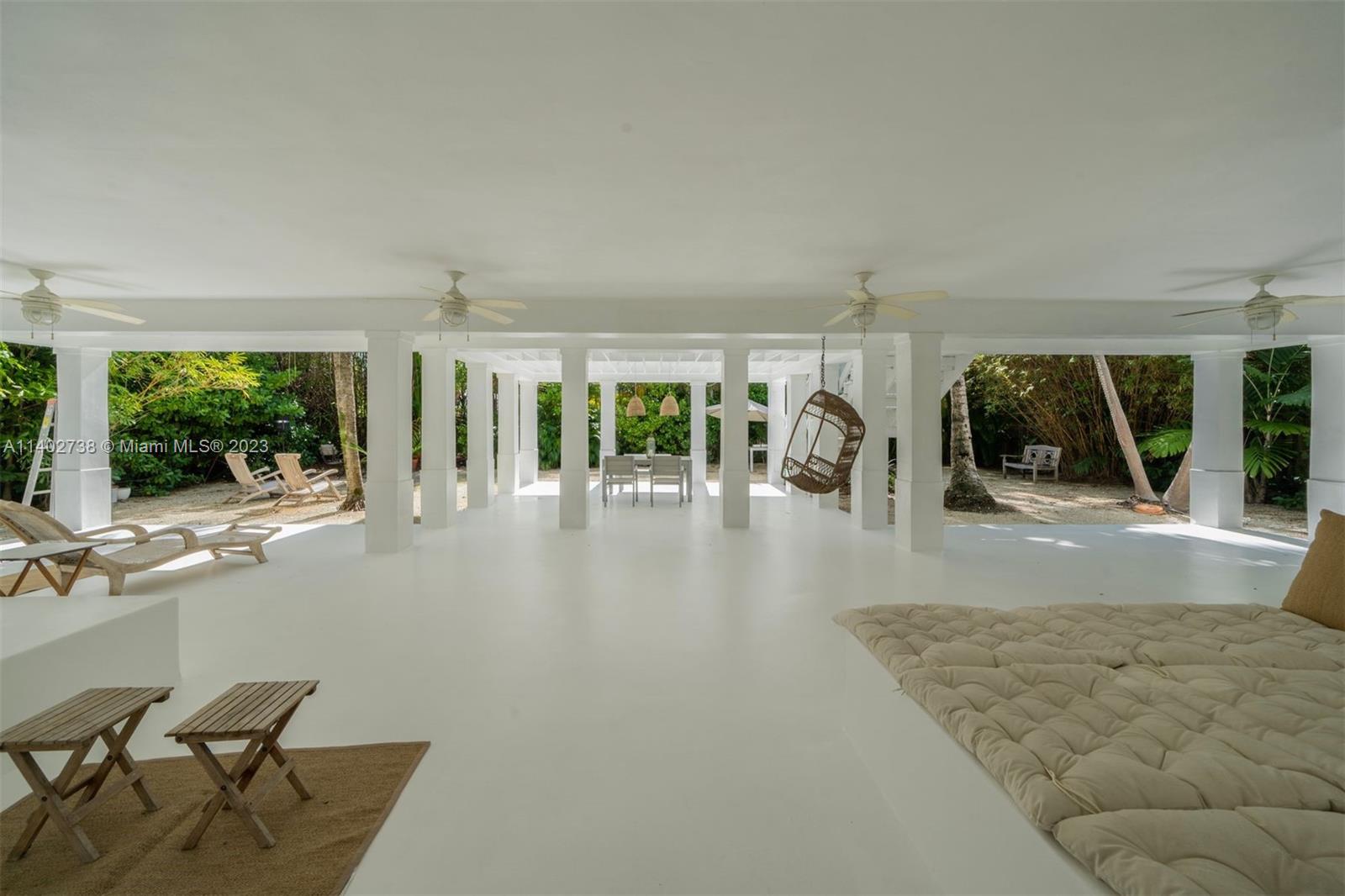 265 Hampton Lane Key Biscayne, FL 33149 - Photo 17 of 23 a view of a living room and window