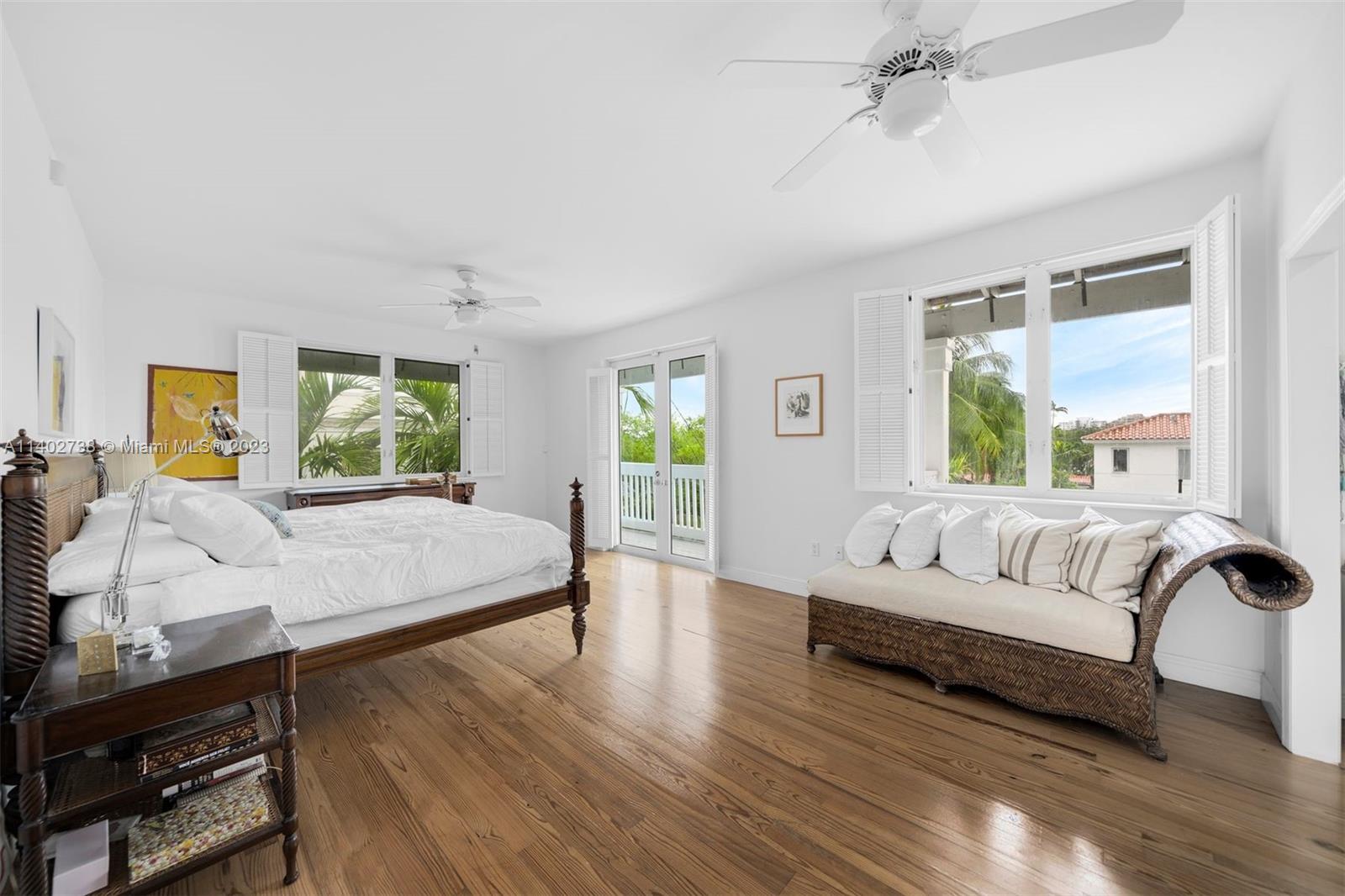 265 Hampton Lane Key Biscayne, FL 33149 - Photo 8 of 23 a living room with furniture and a large window
