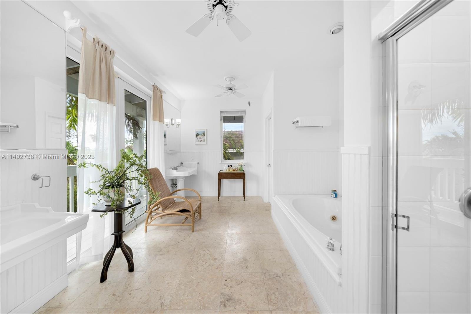 265 Hampton Lane Key Biscayne, FL 33149 - Photo 9 of 23 a view of a livingroom with furniture and a potted plant