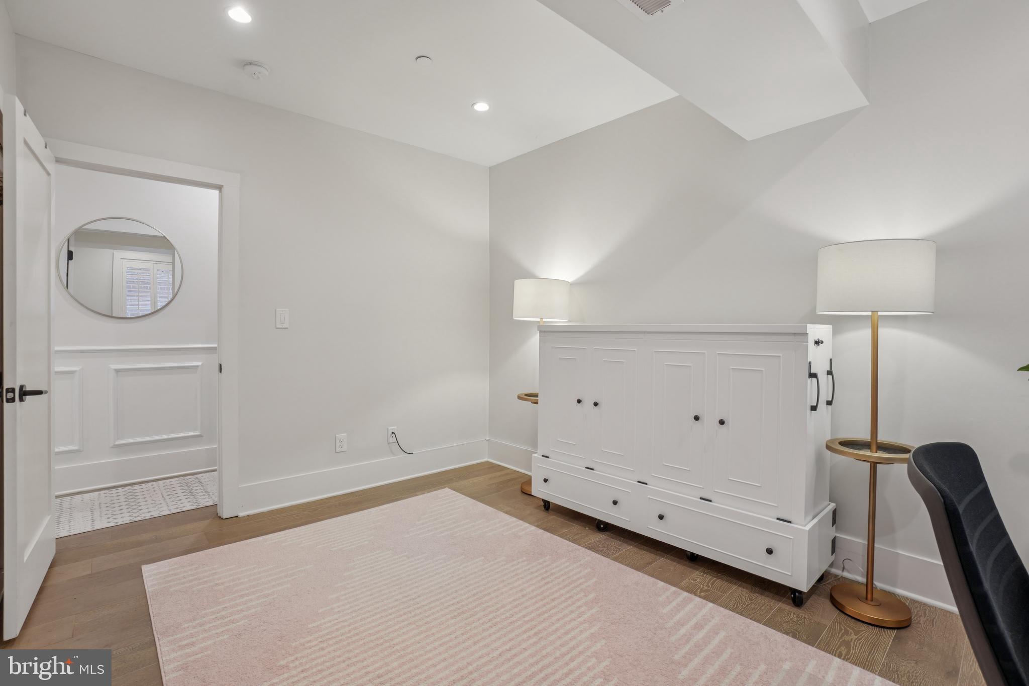 1682 Irving Street Northwest, Unit 2 Washington, DC 20010 - Photo 12 of 25 a room with a desk and chair