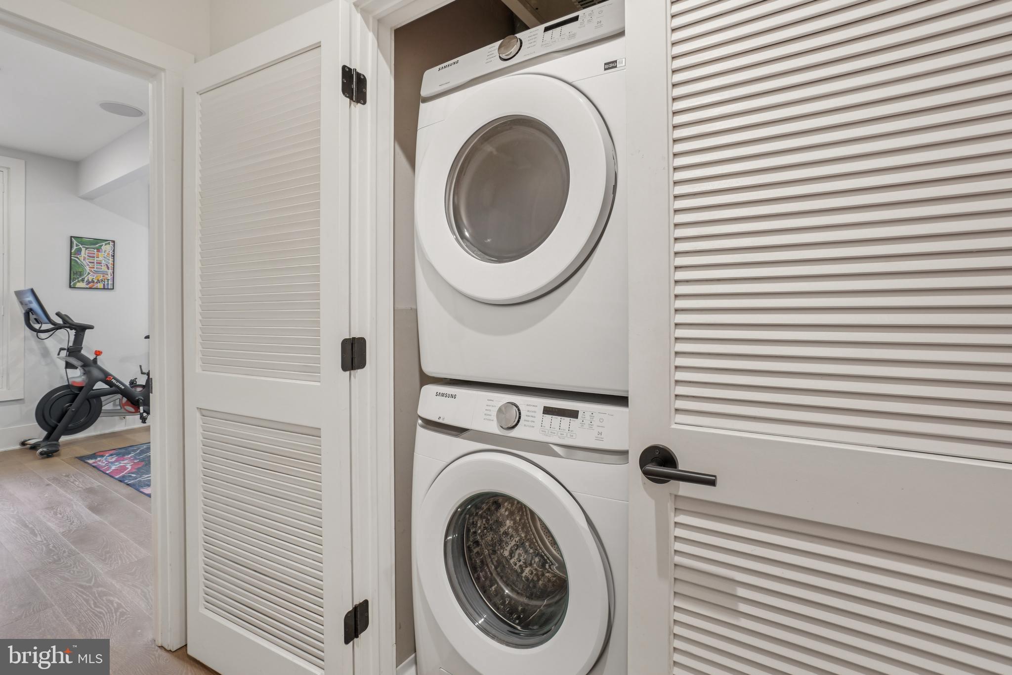 1682 Irving Street Northwest, Unit 2 Washington, DC 20010 - Photo 14 of 25 a utility room with dryer and washer