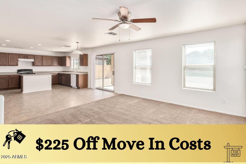 a view of kitchen with furniture and window