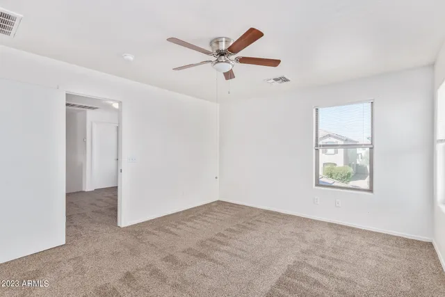 a bathroom with a double vanity sink and mirror