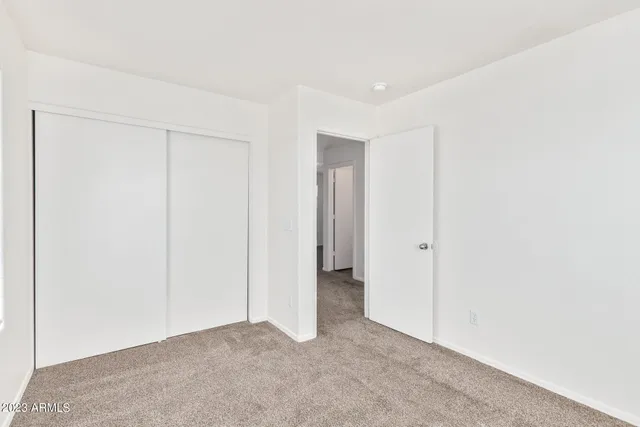 a bathroom with a sink toilet vanity and shower