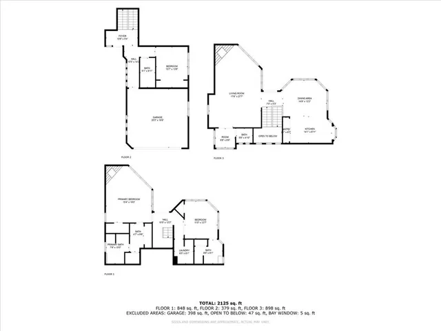 an aerial view of ocean and residential houses with outdoor space