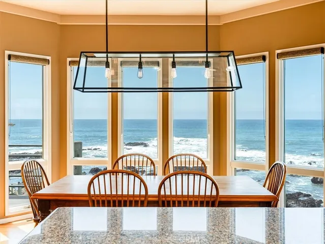 a view of living room with balcony furniture