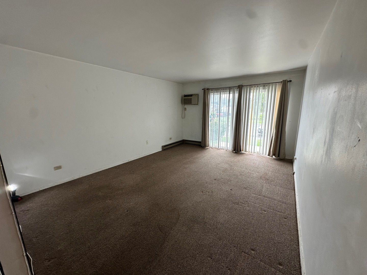 850 East Old Willow Road, Unit 108 Prospect Heights, IL 60070 - Photo 5 of 9 an empty room with windows