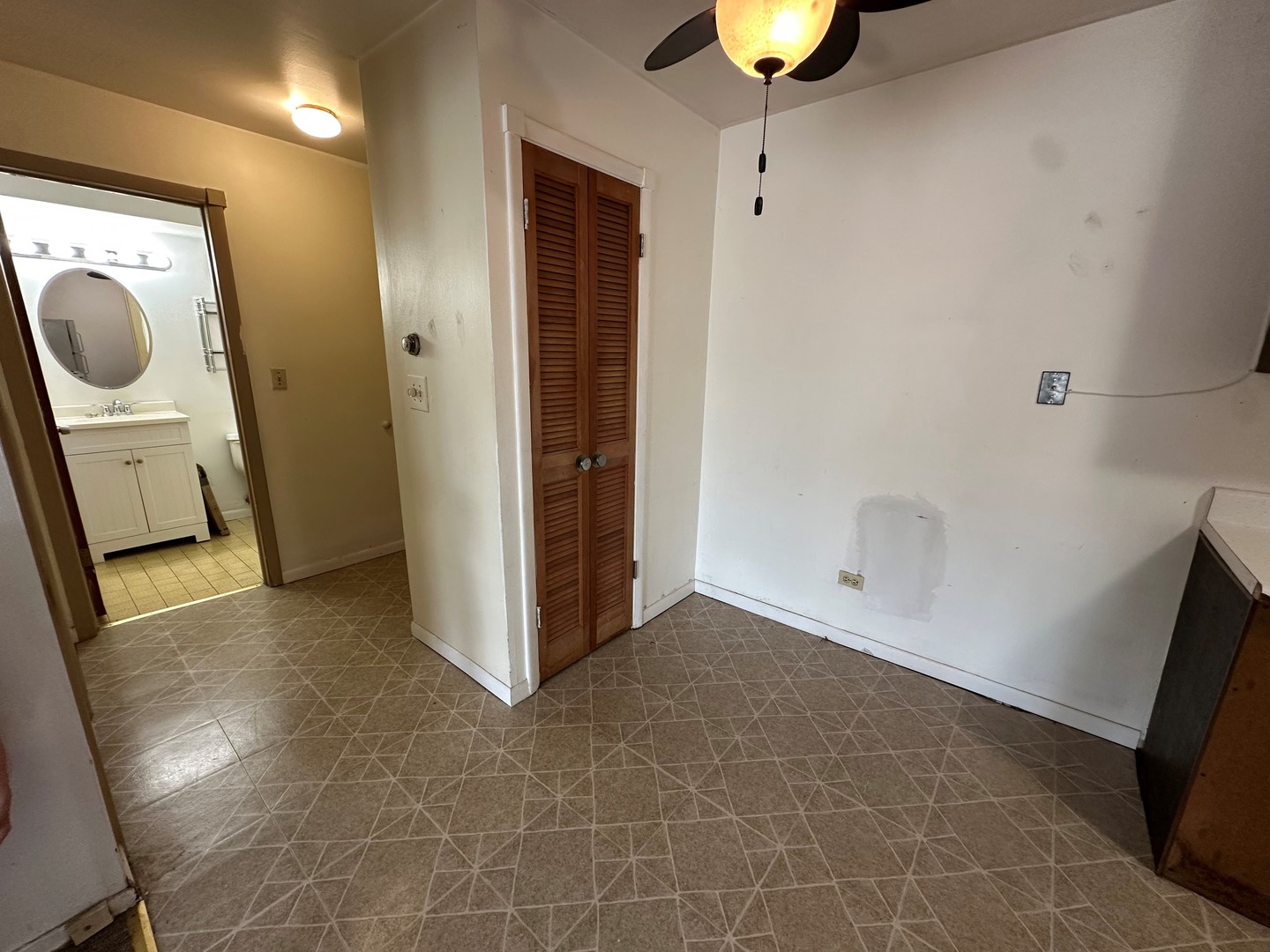 850 East Old Willow Road, Unit 108 Prospect Heights, IL 60070 - Photo 8 of 9 a view of a storage & utility room with wooden floor