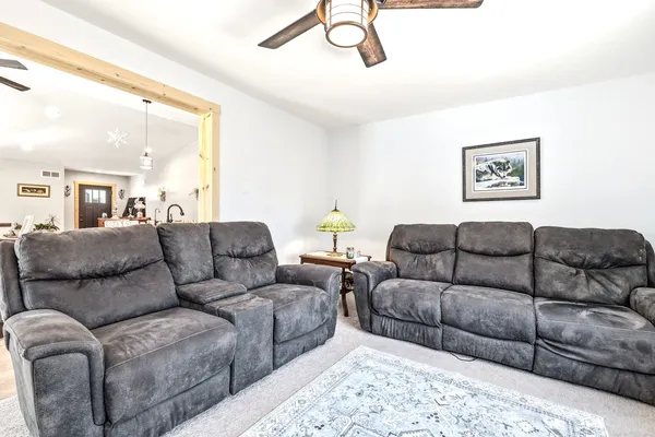 a living room with furniture and a couch