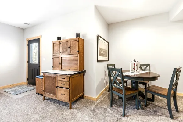 a view of a workspace with furniture