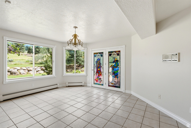 3535 Homestead Road Park City, UT 84098 - Photo 20 of 81 Neutral-toned tiled flooring complemented by white walls and trim