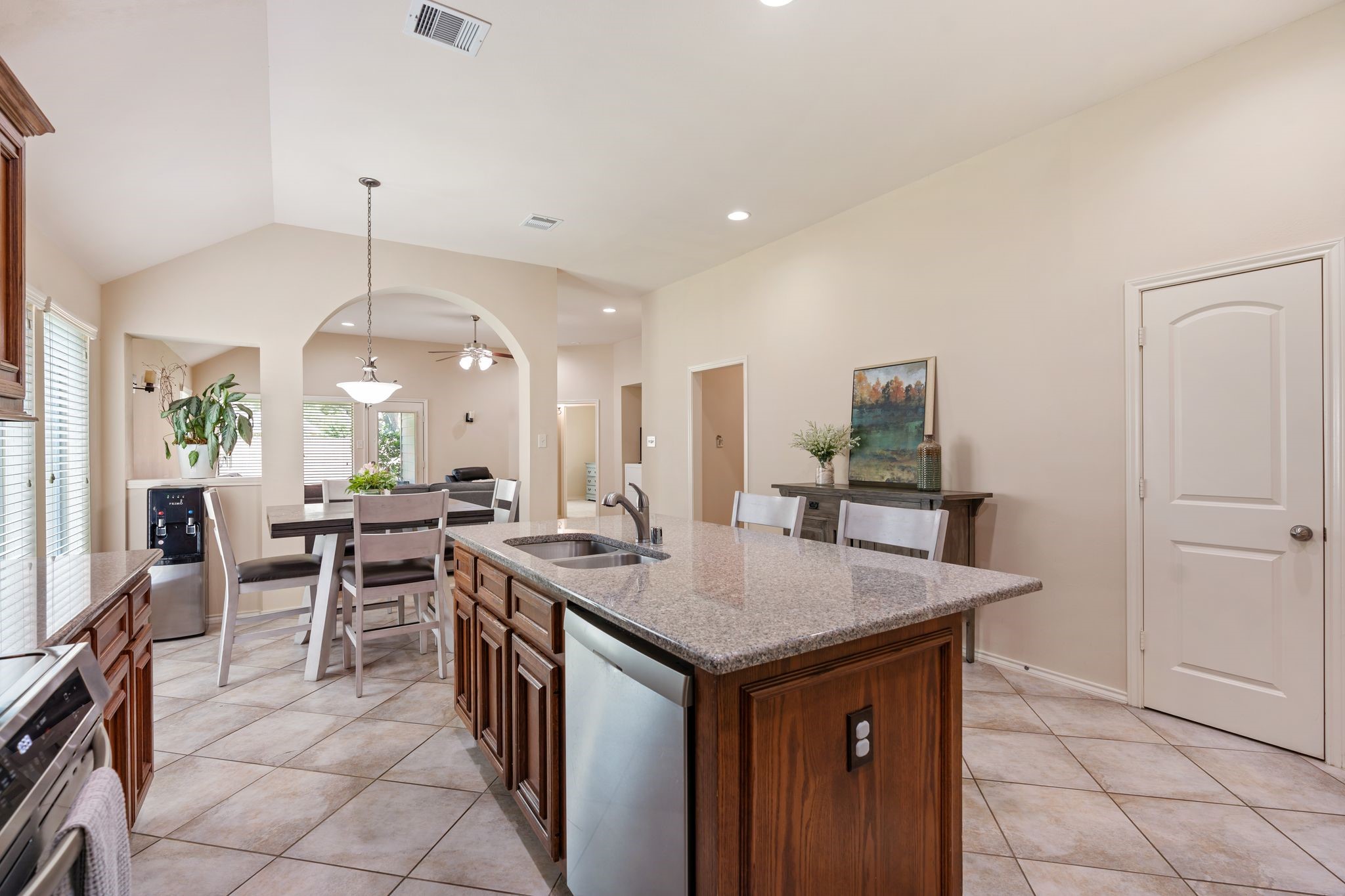 2606 Silverton Bend Rosenberg, TX 77471 - Photo 12 of 26 Another view showcasing the kitchen's open flow into the breakfast area and family room.