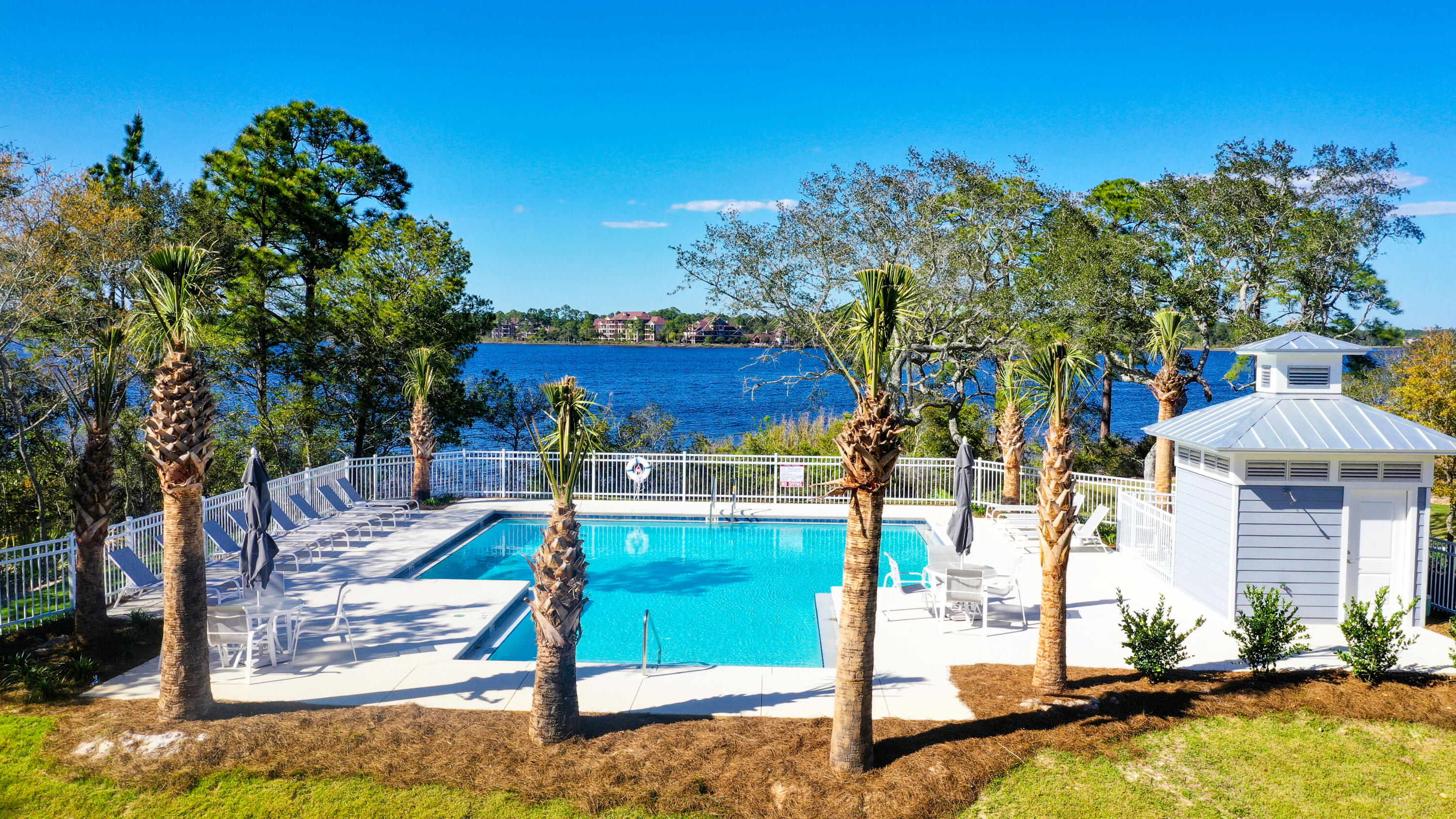 22958 Ann Miller Road Panama City Beach, FL 32413 - Photo 25 of 29 a view of a house with swimming pool