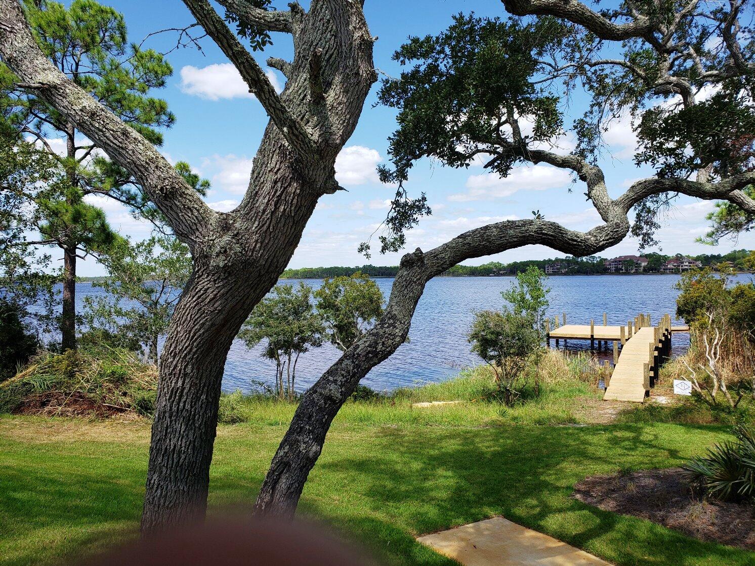 22958 Ann Miller Road Panama City Beach, FL 32413 - Photo 5 of 29 a view of a yard in front of the house