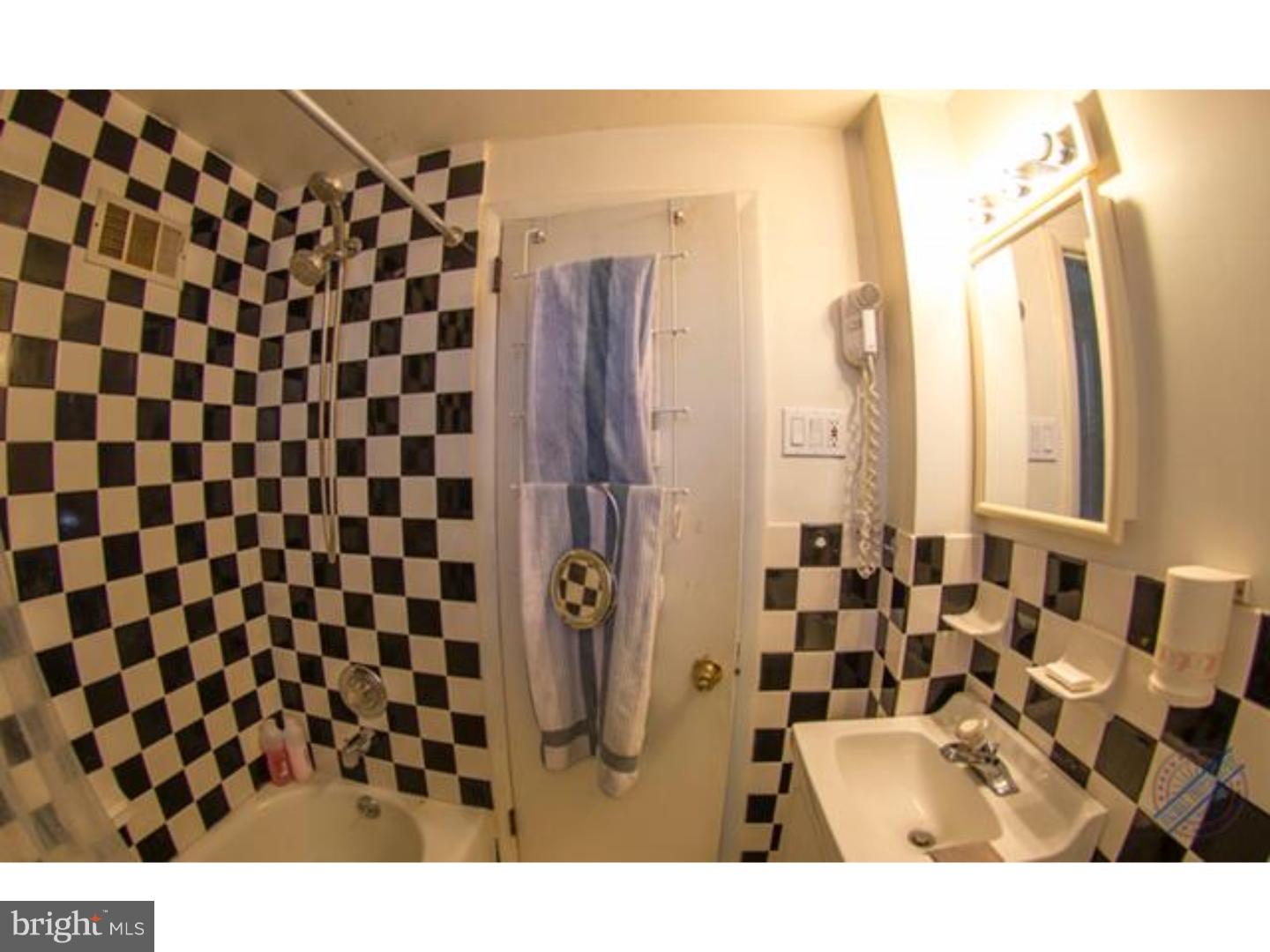 419 W Road Ridley Park, PA 19078 - Photo 11 of 22 a bathroom with a sink and a mirror