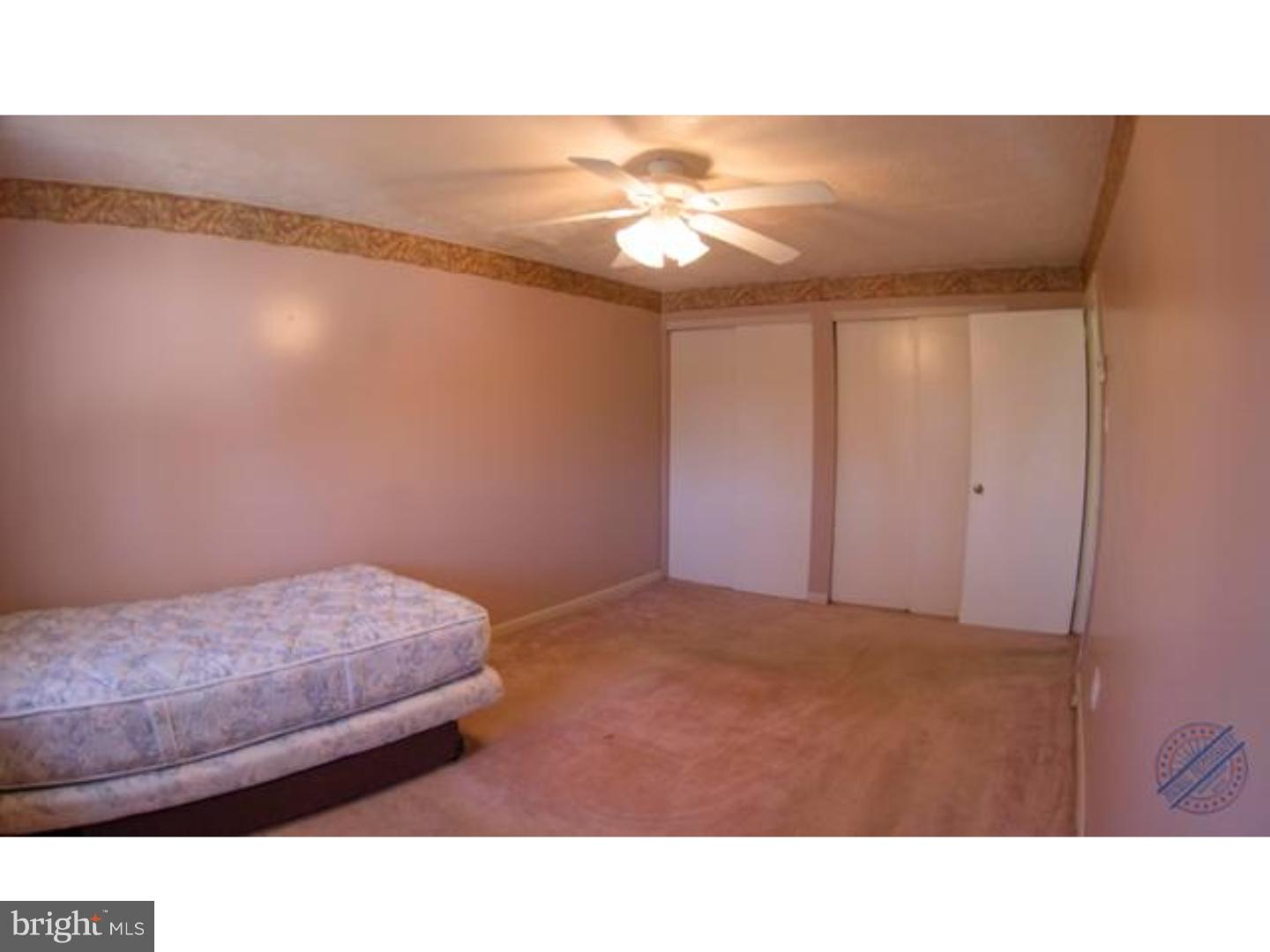 419 W Road Ridley Park, PA 19078 - Photo 12 of 22 a room with a bed and a view of closet