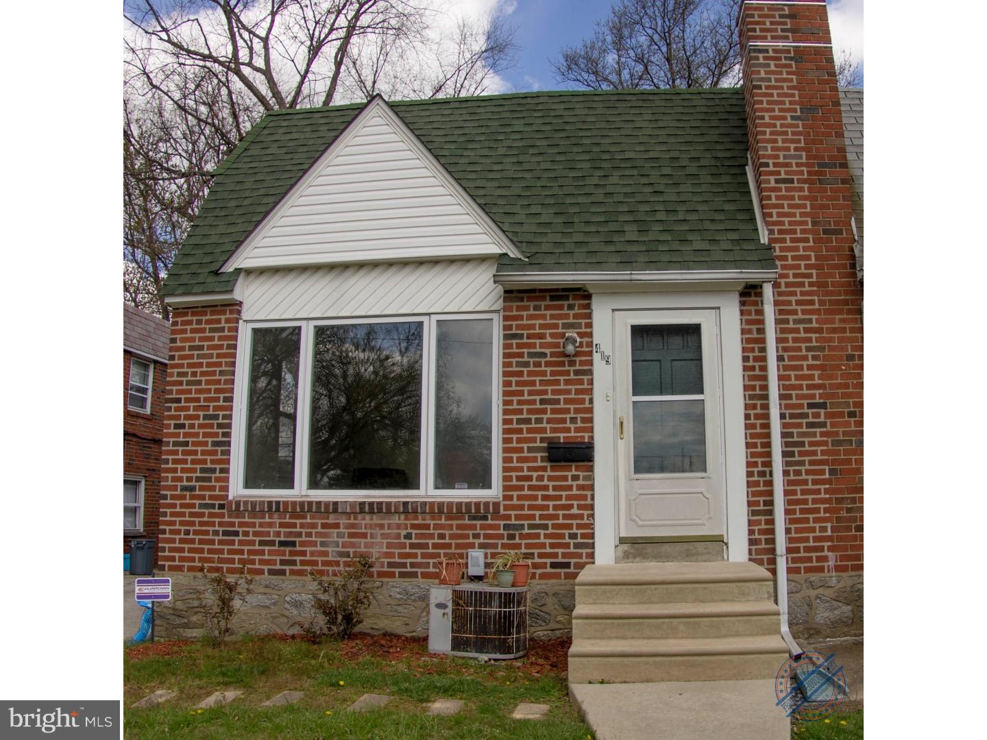 419 W Road Ridley Park, PA 19078 - Photo 3 of 22 a front view of a house with a garden