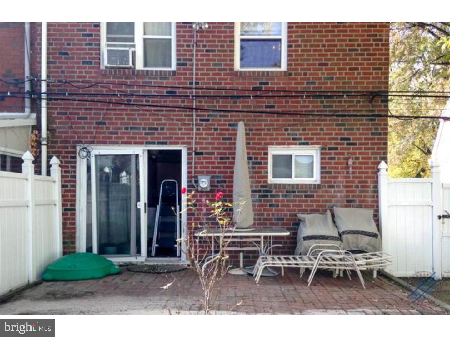 419 W Road Ridley Park, PA 19078 - Photo 22 of 22 a backyard of a house with outdoor seating