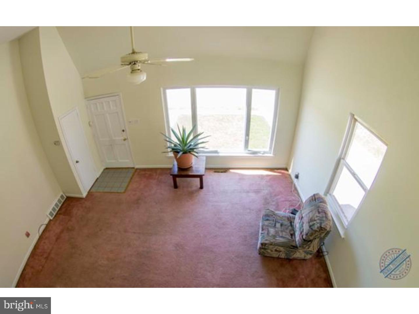 419 W Road Ridley Park, PA 19078 - Photo 5 of 22 a living room with furniture and a large window