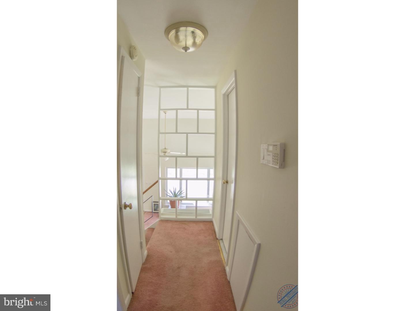 419 W Road Ridley Park, PA 19078 - Photo 9 of 22 a view of a hallway with a white walls