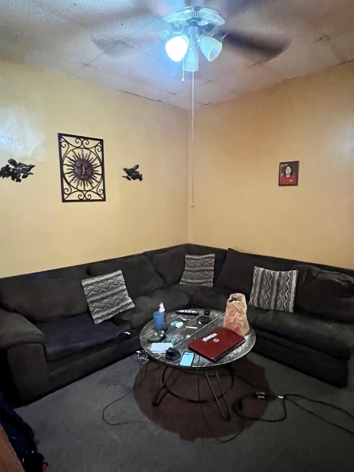 60-85 55th Street Queens, NY 11378 - Photo 2 of 8 a living room with furniture and a lamp