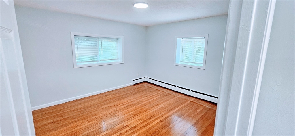 7 Oakcrest Road, Unit 6 Boston, MA 02136 - Photo 7 of 10 a view of empty room with window