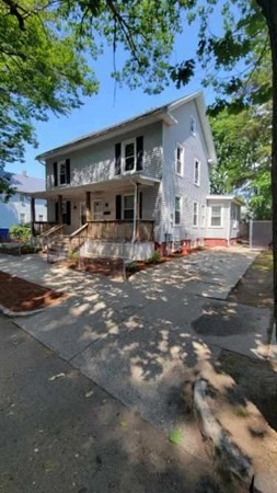 75 Pine Street Springfield, MA 01105 - Photo 1 of 40 a front view of a house with yard