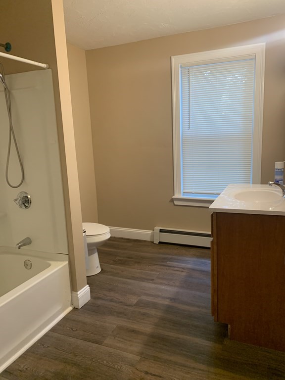 75 Pine Street Springfield, MA 01105 - Photo 24 of 40 a bathroom with a sink a toilet and shower
