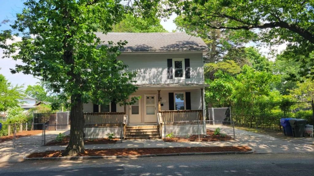 75 Pine Street Springfield, MA 01105 - Photo 3 of 40 a front view of a house with garden