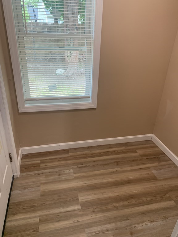 75 Pine Street Springfield, MA 01105 - Photo 33 of 40 a view of a room with wooden floor and a window