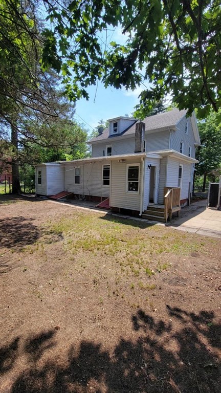 75 Pine Street Springfield, MA 01105 - Photo 4 of 40 a front view of a house with a yard