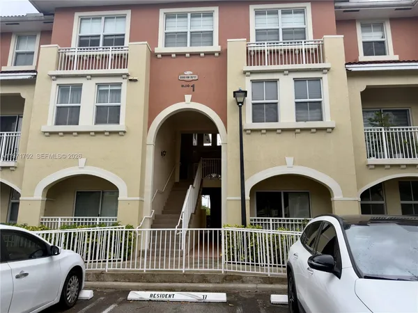 a front view of a house with balcony