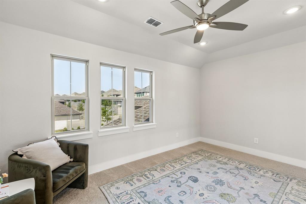 3004 Windy Rdg Road McKinney, TX 75071 - Photo 23 of 40 wooden floor in an empty room with a window