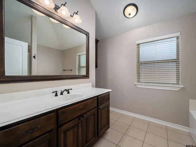 a view of cabinets with wooden floor