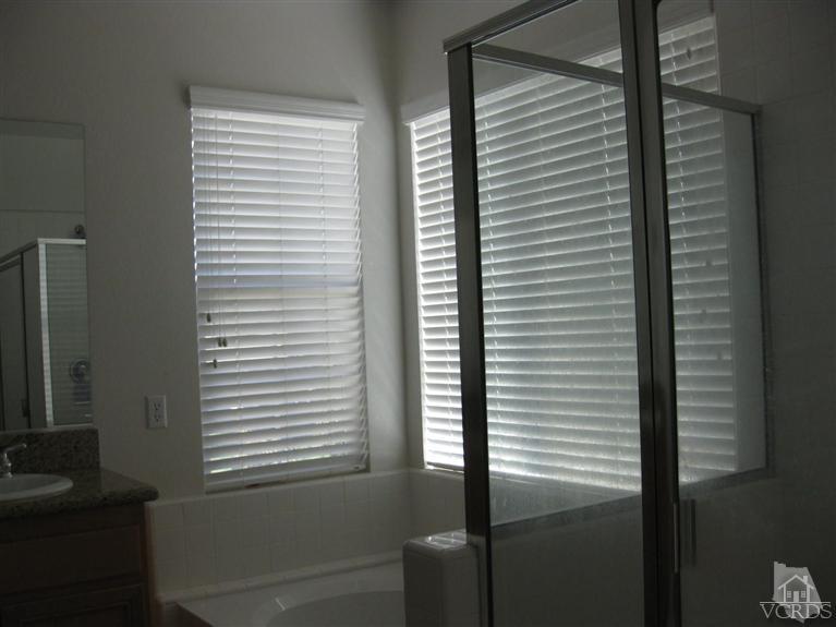 4774 Promenade Street Simi Valley, CA 93063 - Photo 11 of 21 a bathroom with a window