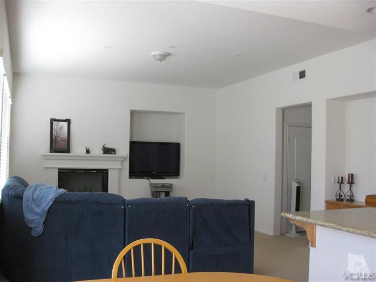 4774 Promenade Street Simi Valley, CA 93063 - Photo 16 of 21 a living room with furniture and a flat screen tv