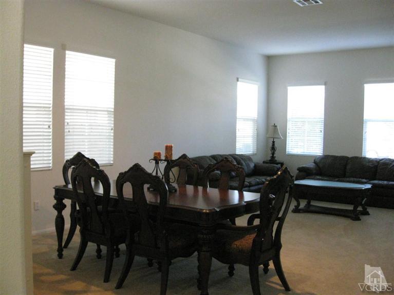 4774 Promenade Street Simi Valley, CA 93063 - Photo 4 of 21 a view of a dining room with furniture and window