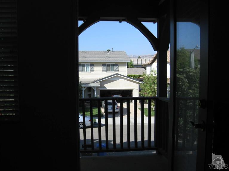 4774 Promenade Street Simi Valley, CA 93063 - Photo 8 of 21 a view of a two chairs in the balcony