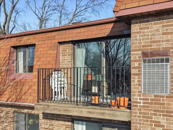 a view of house with a large window